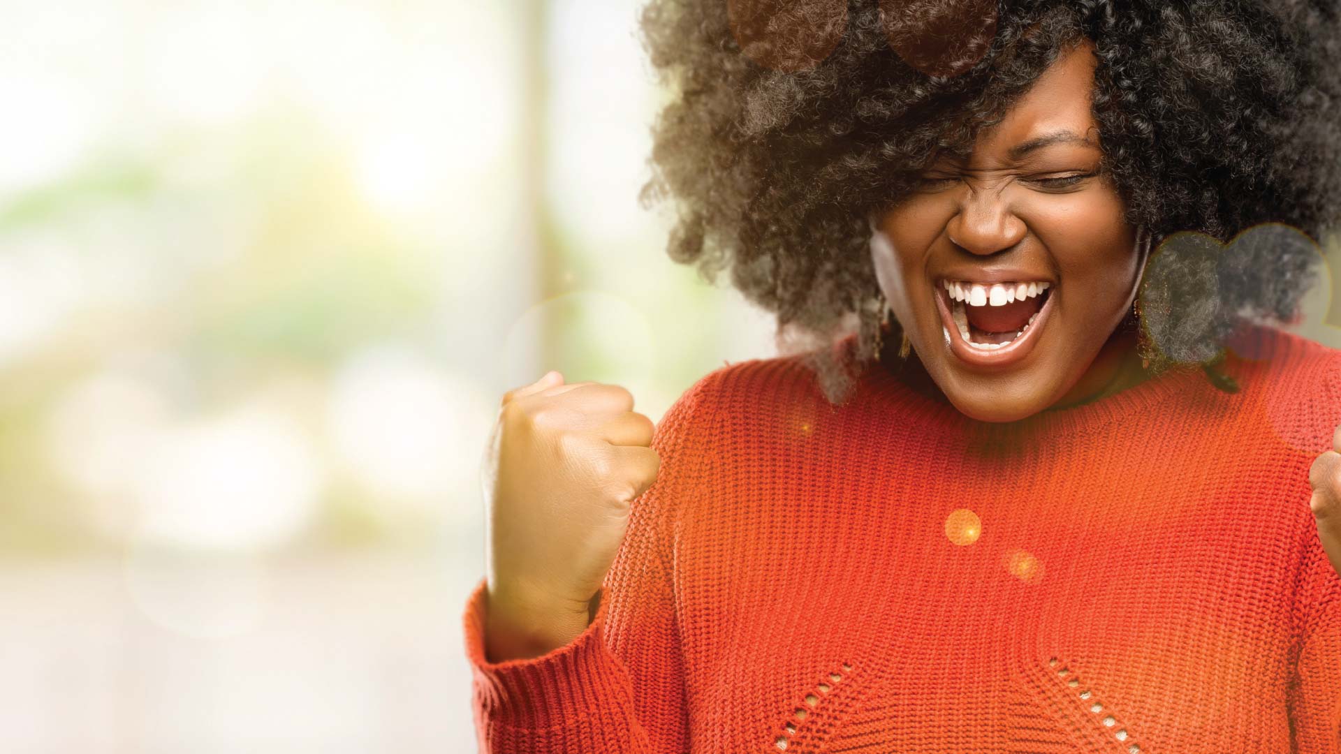 Beautiful African woman happy and excited