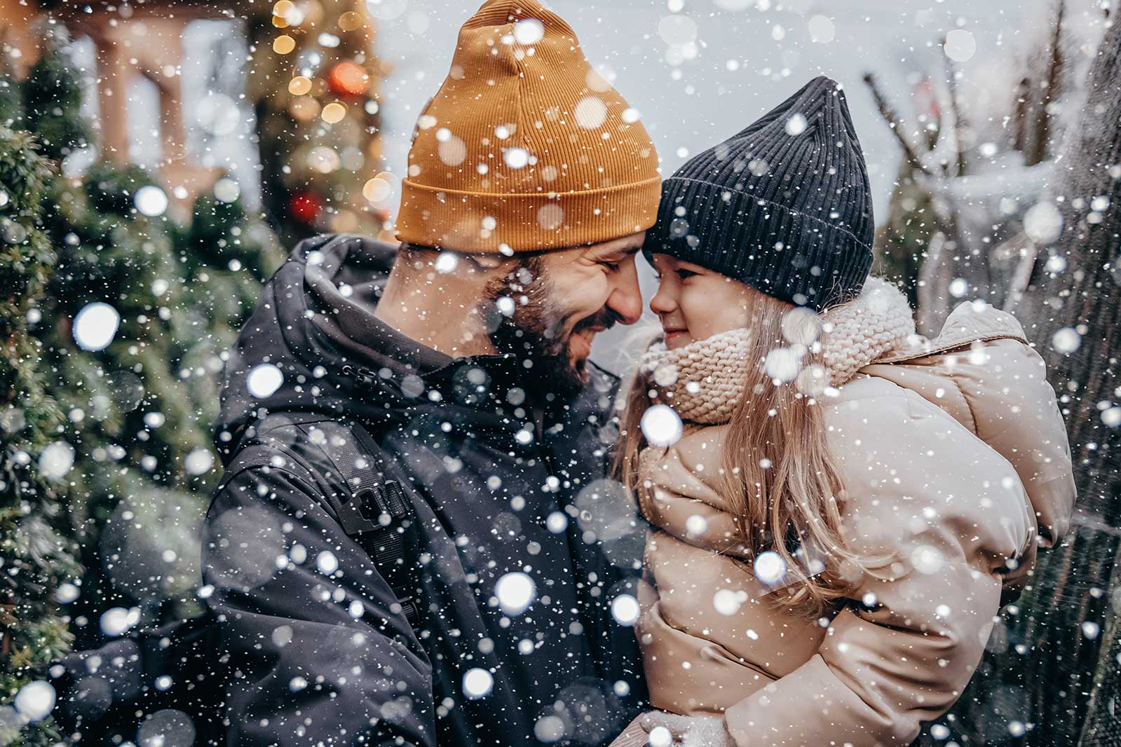 Happy Father And Daughter Choosing A Christmas Tree