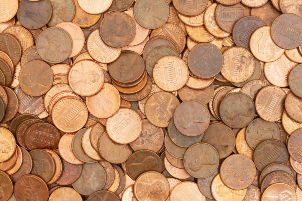 Lots of pennies money background.