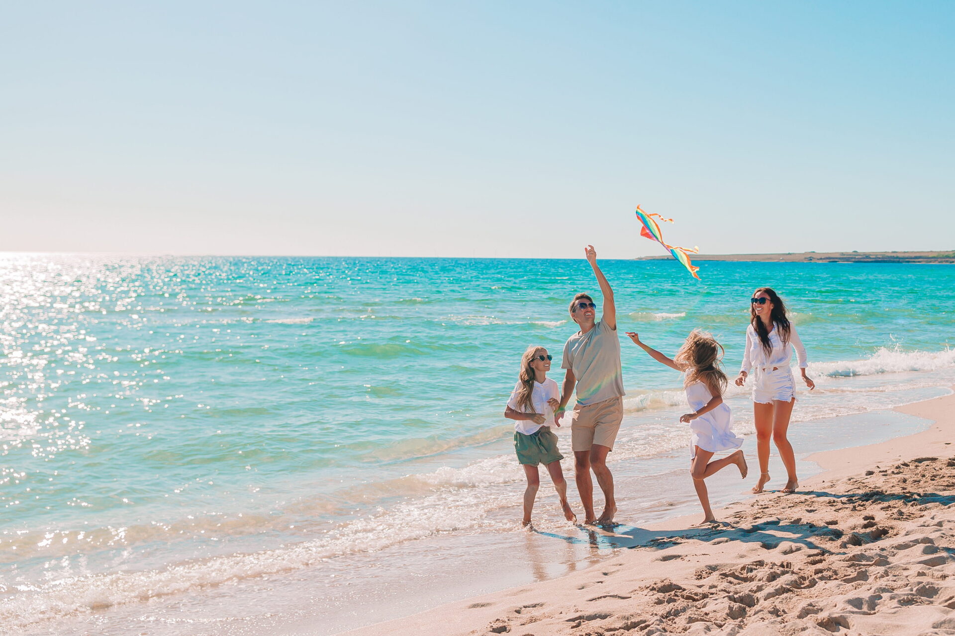 Image of family on beach.
