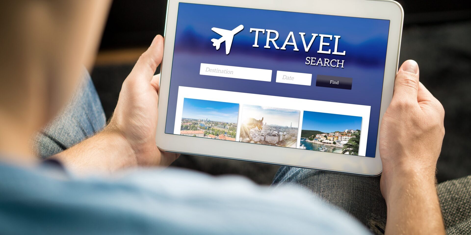 Man looks through options for vacation rentals, being careful to avoid a vacation rental scam.