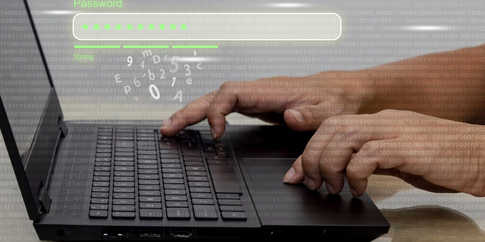 A man typing on a laptop with a green screen, focused on creating a secure password.