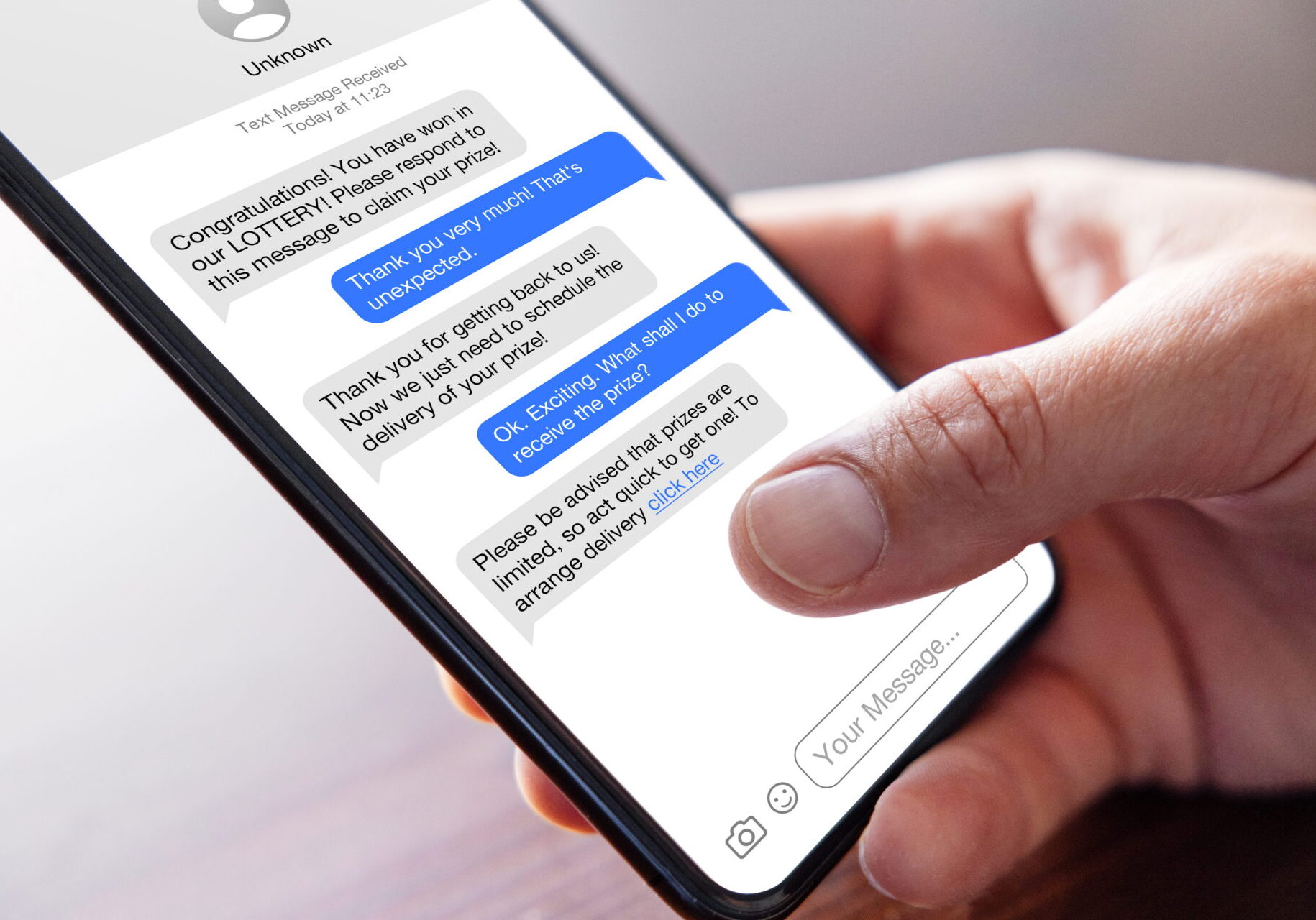 iPhone text messages, focusing on an example of a phishing scam.