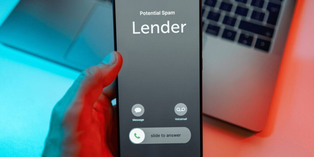 Smartphone screen displaying a "Potential Spam" call alert, representing unsolicited calls from trigger leads after a mortgage application.