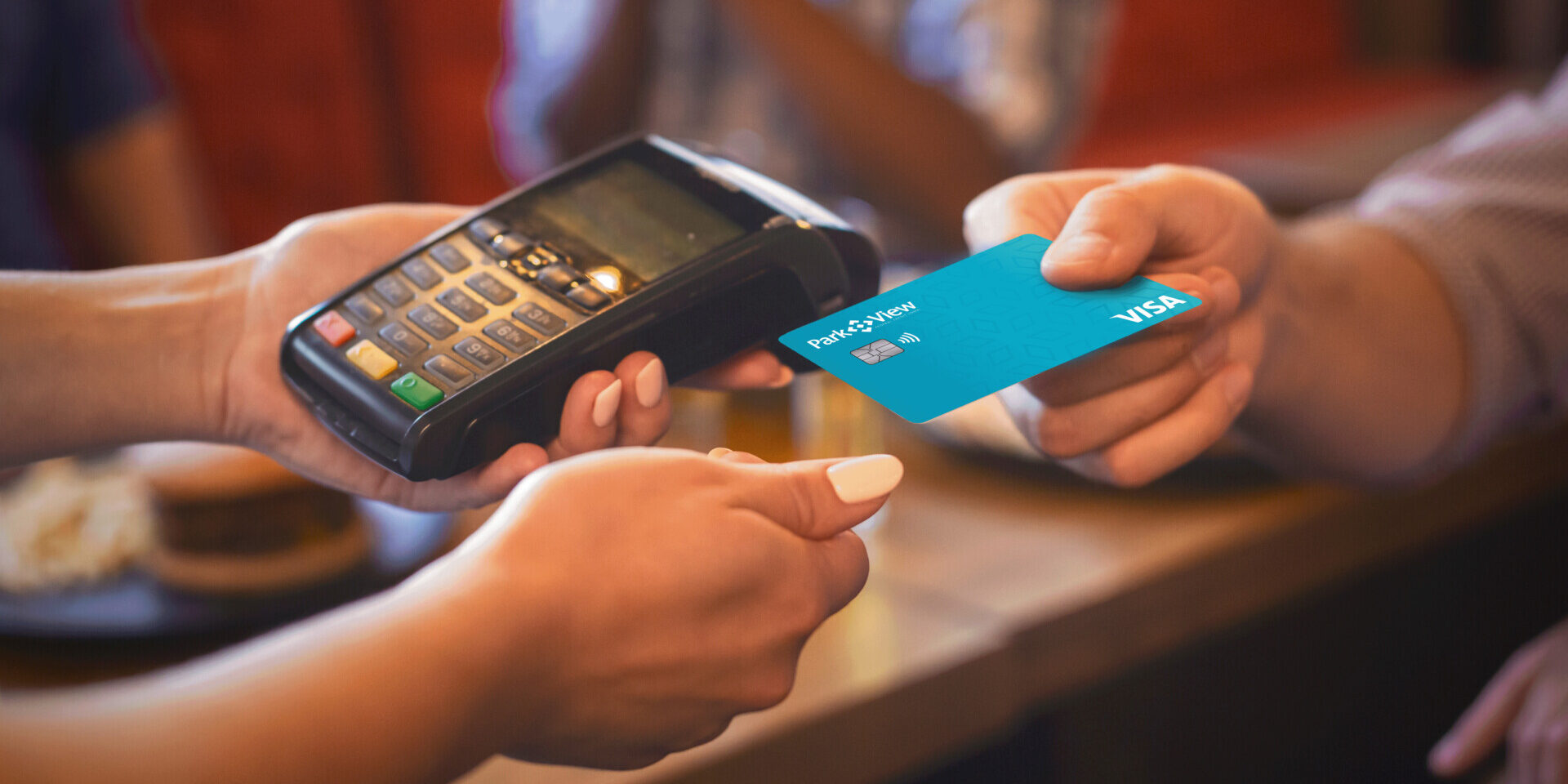 Image showing credit card being used to pay. Credit Card utilization ratio concept.